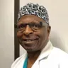 Dr.  Adebayo Adesomo, MD