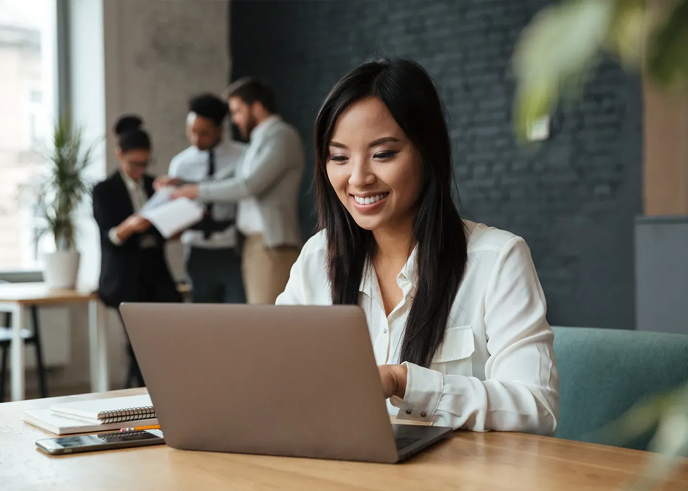 young woman on her laptop